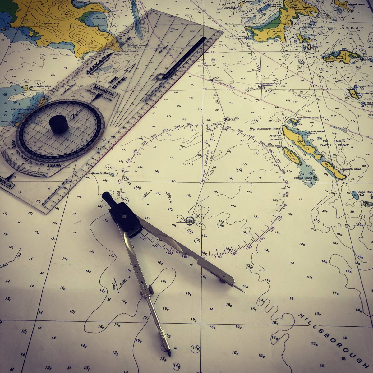 navigation chart, compass and slide rule