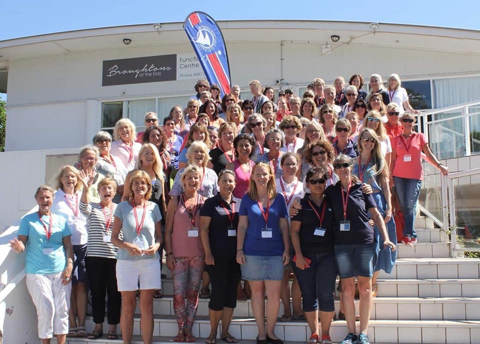 large group of women at sailing conference