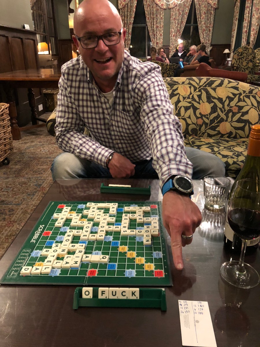 Andrew Herriott playing scrabble in Scotland