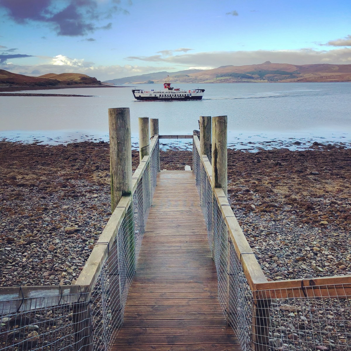 Ferry passing jetty on Isle of Skye