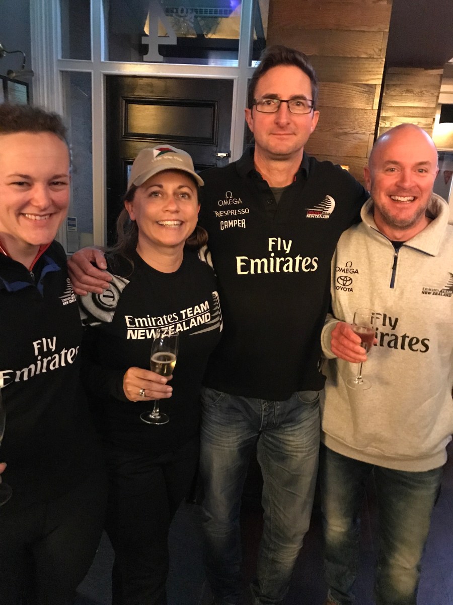 Camilla Gibbons, Viki Moore, Craig Edwards and Andrew Herriott wearing Emirates Team New Zealand T shirts