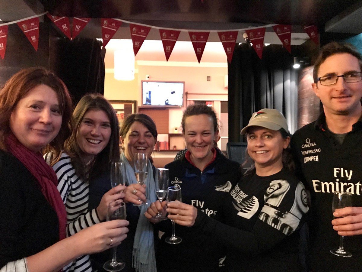 friends celebrating with champagne at No 4 Bar in Merivale