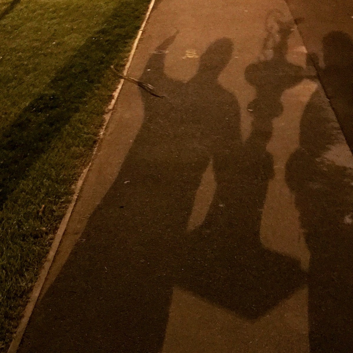 Shadow of a man with the Americas Cup